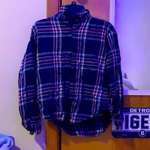 Plaid button down shirt. Size L in kids